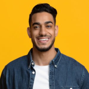 smiling middle eastern man in casual with laptop y9ey47v.jpg